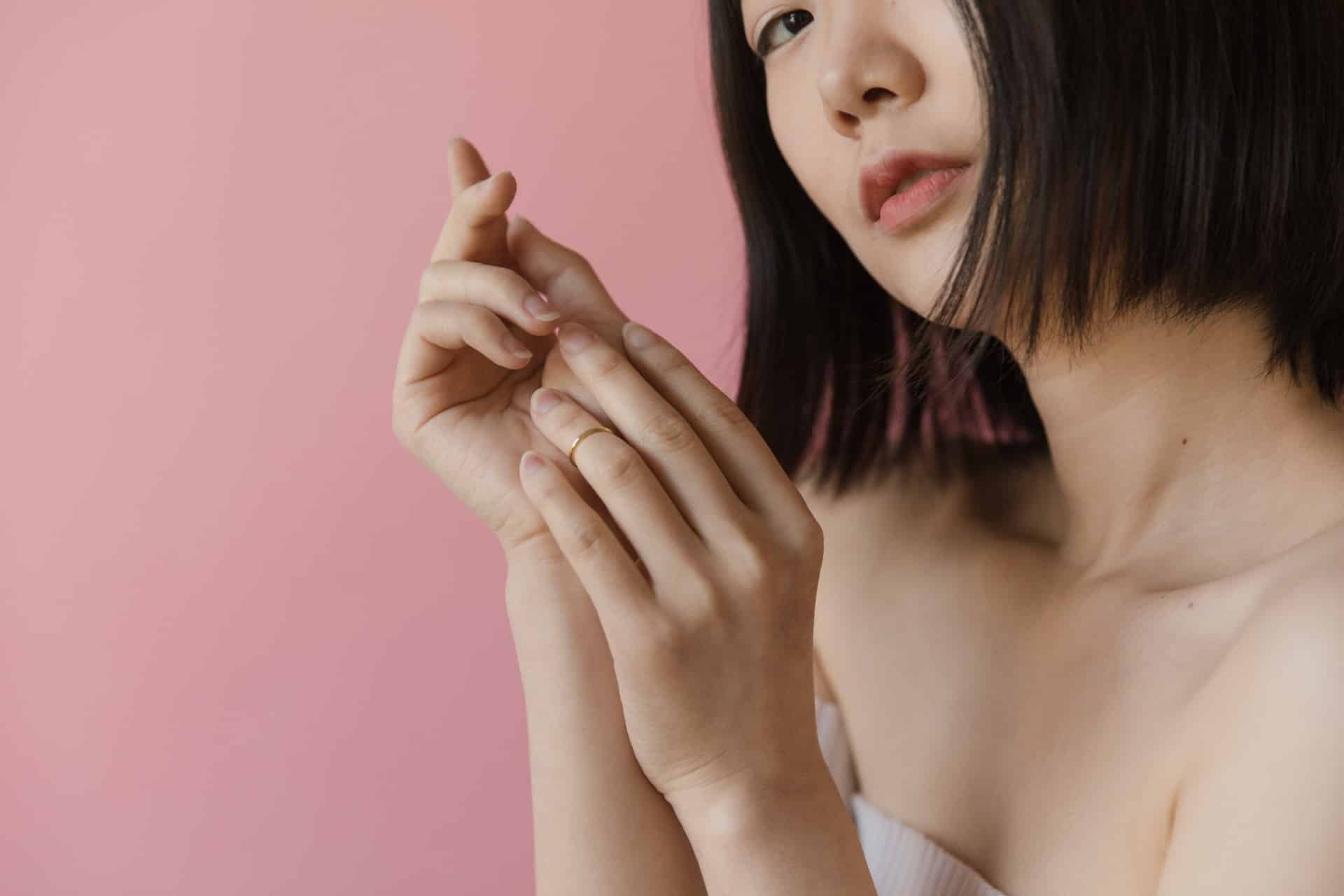 Woman with smooth skin highlighting skincare results